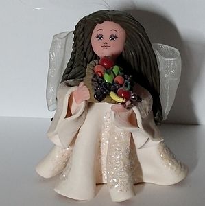Kneaded Angels Avon Figurine With Fruit